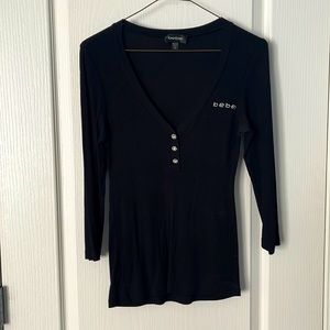 Bebe deep-V with 3/4 sleeve & sparkle button detail.